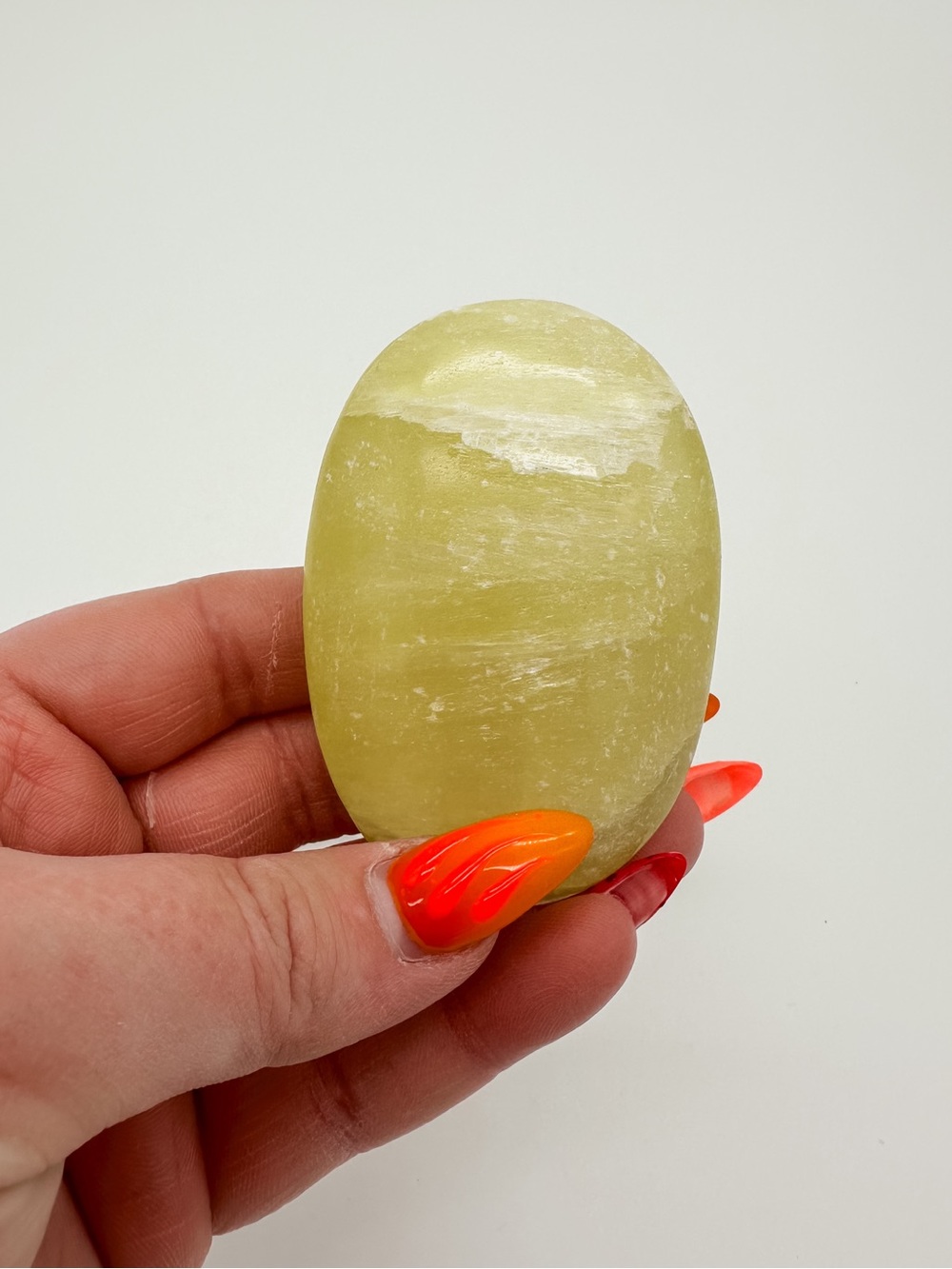Polished Yellow Green Selenite Palm Stone